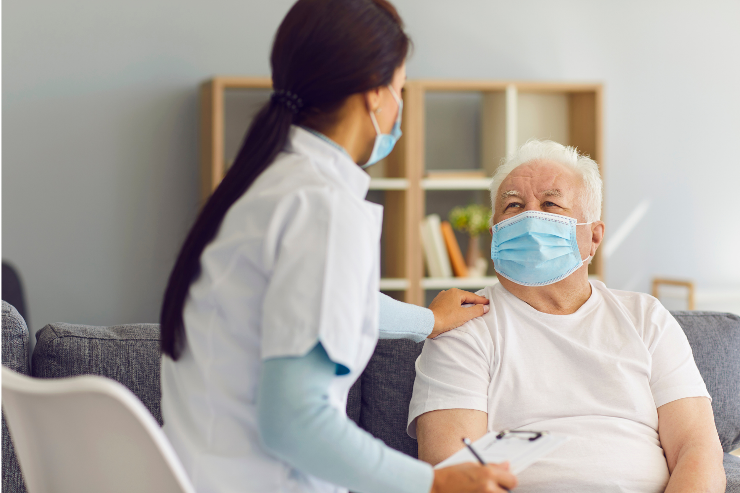 Respiratory care nurse with patient